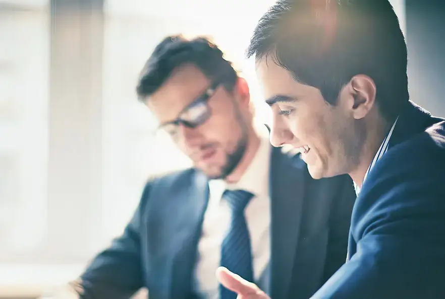 Happy Malaysian business owner receiving ISO 9001 certification from YHY Consultancy